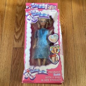 A vintage pregnant doll